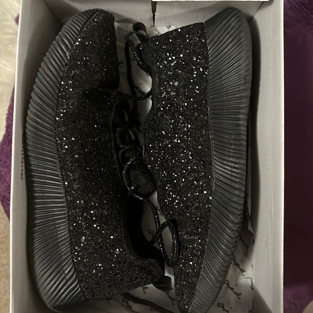Black glitter tennis shoes. Used and in good condition! Smoke free home.